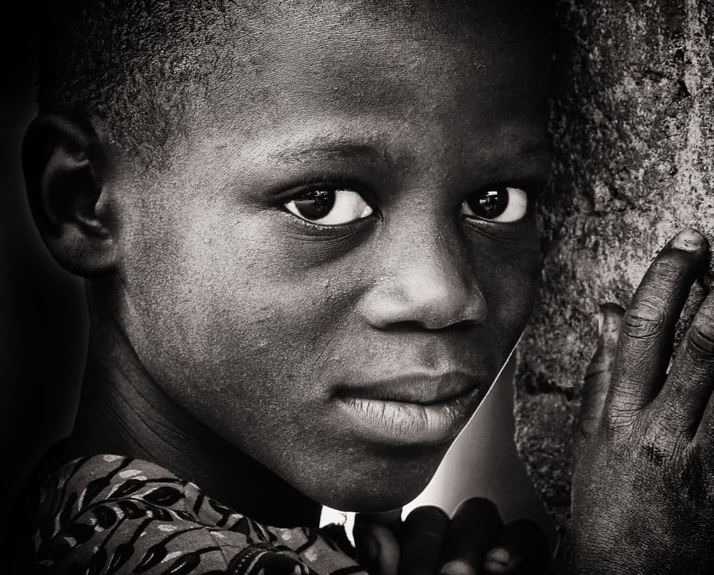Thoughtful Boy's Gaze by Elena Molina — canvas wall art