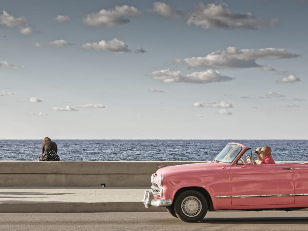 Pink Car Seaside Journey by Bjorn Bjornson — canvas wall art