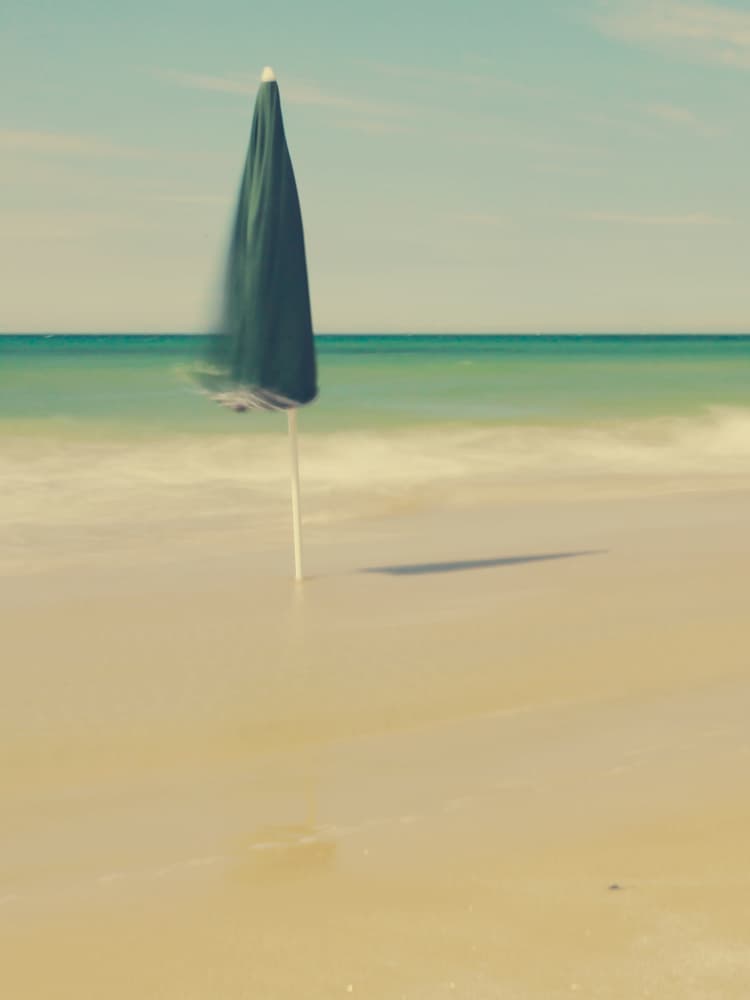 Serene Beach Umbrella by Massimo Della Latta — canvas wall art