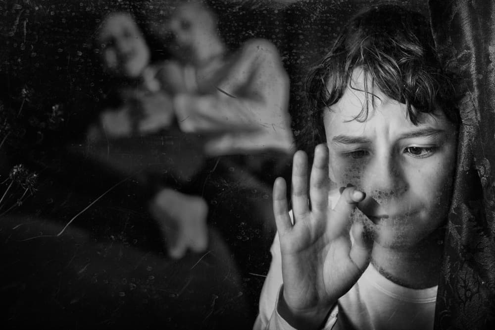 Sad Boy At Window by Mirjam Delrue — canvas wall art