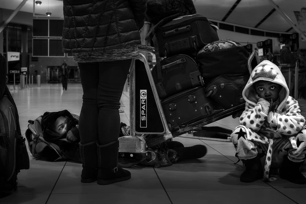 Waiting Child Airport Scene by stephanusjs — canvas wall art
