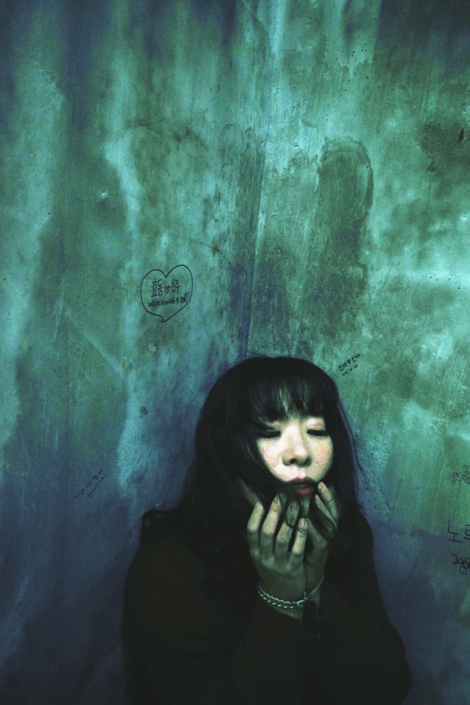 Pensive Girl Green Wall by cindy ahn — canvas wall art