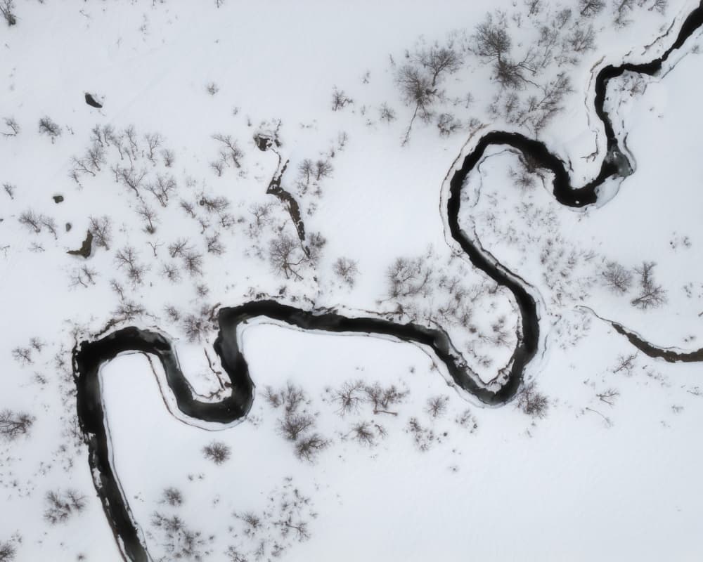 Winding Winter River by Junbo Liang — canvas wall art