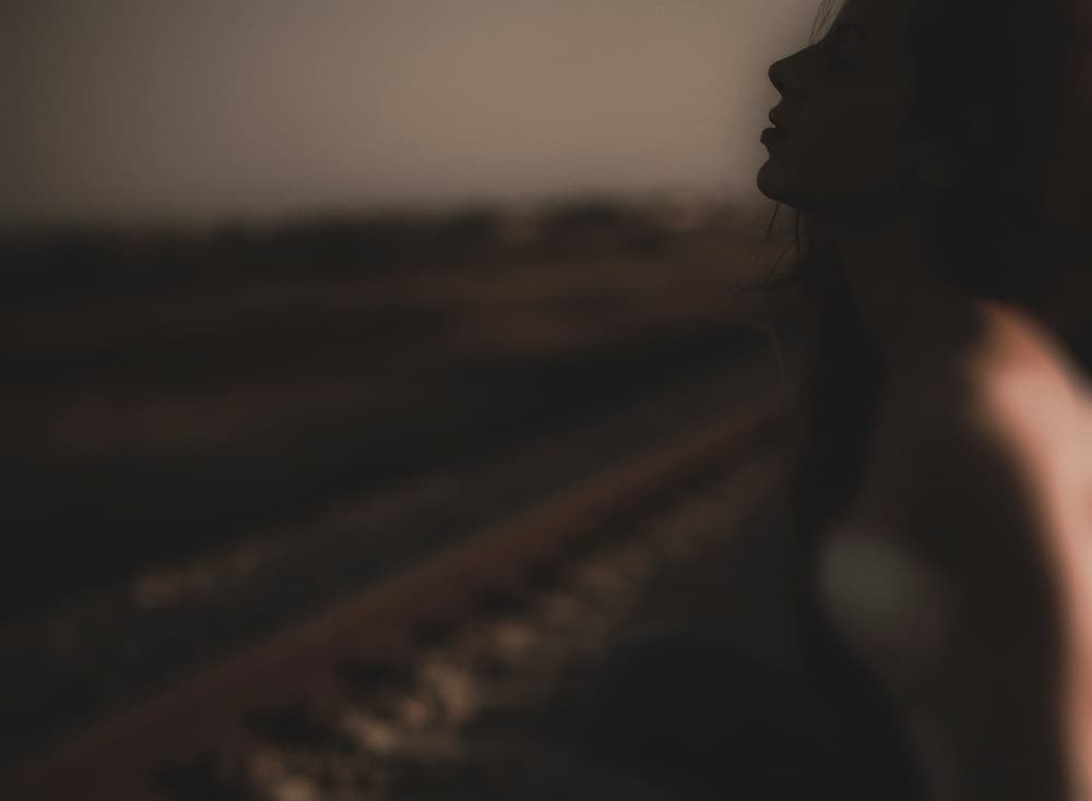 Contemplative Woman Profile by DAVID MINSTER — canvas wall art