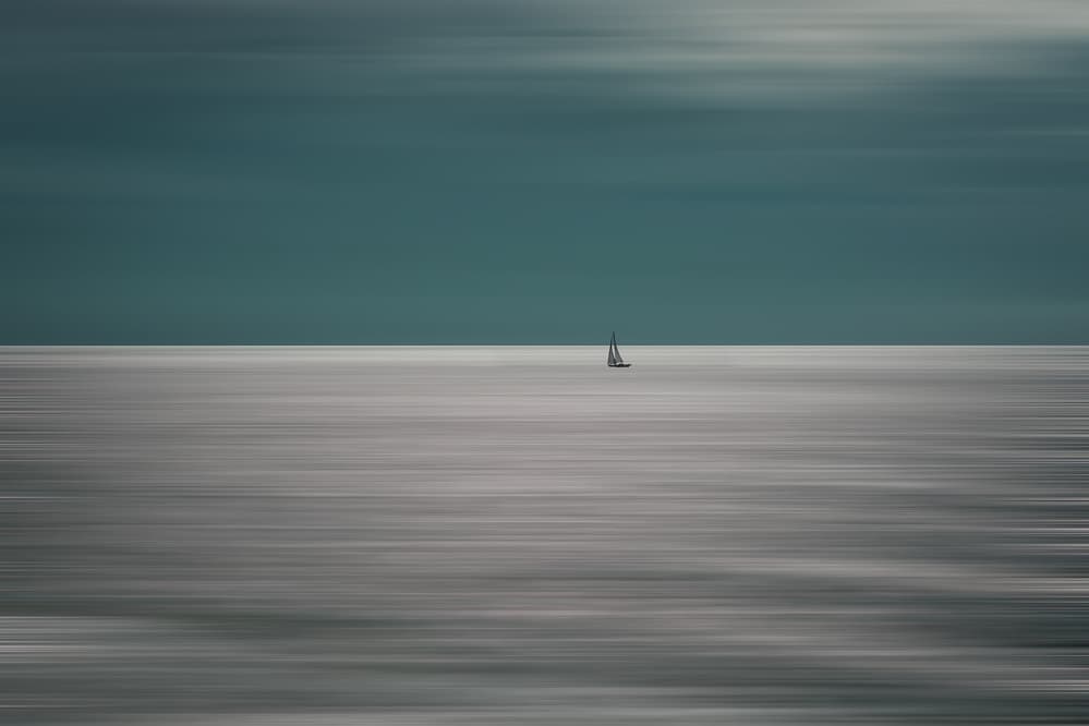 Serene Sailboat Horizon by Bernardine de Laat — canvas wall art