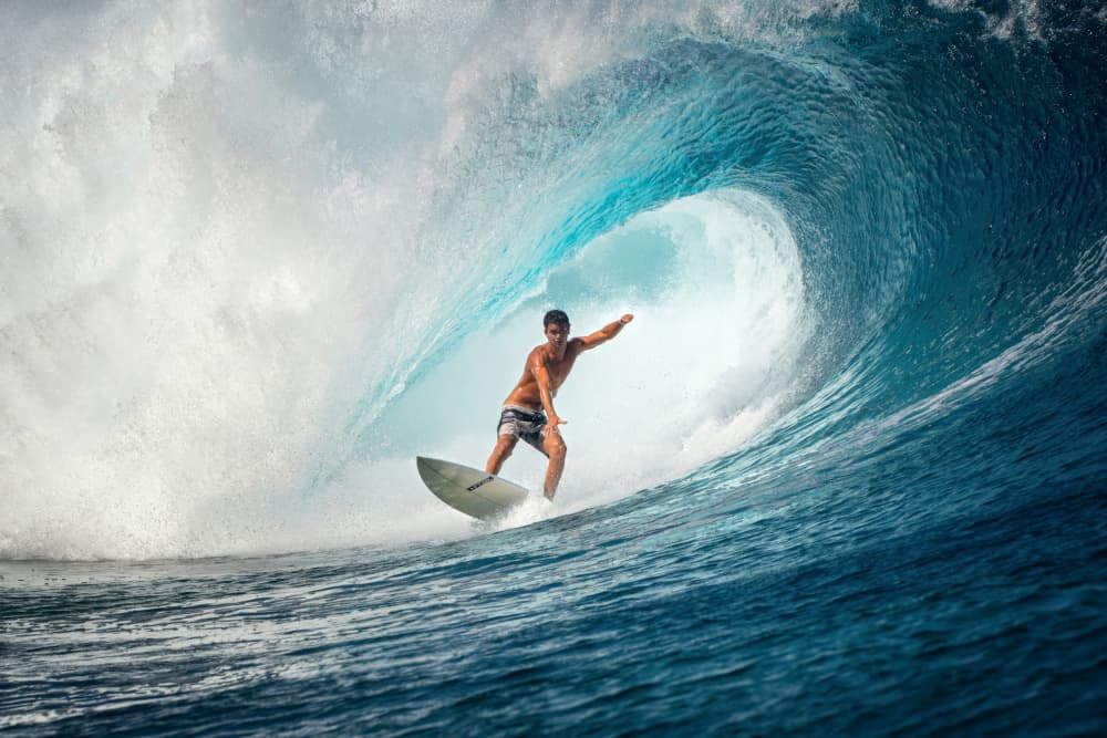 Surfer Riding Barrel Wave by Mathilde Guillemot — canvas wall art
