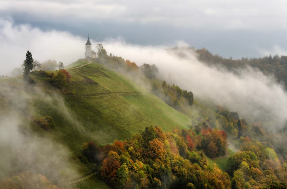 Misty Hilltop Church by Drago Vogrinec — canvas wall art