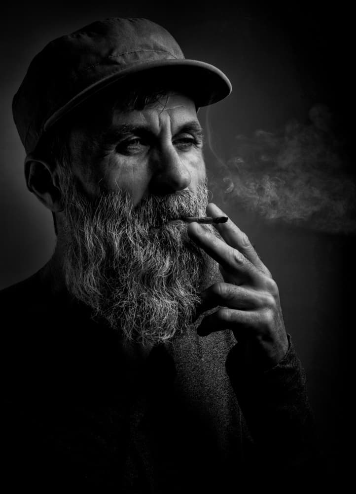 Thoughtful Man Smoking by Grigore Roibu — canvas wall art