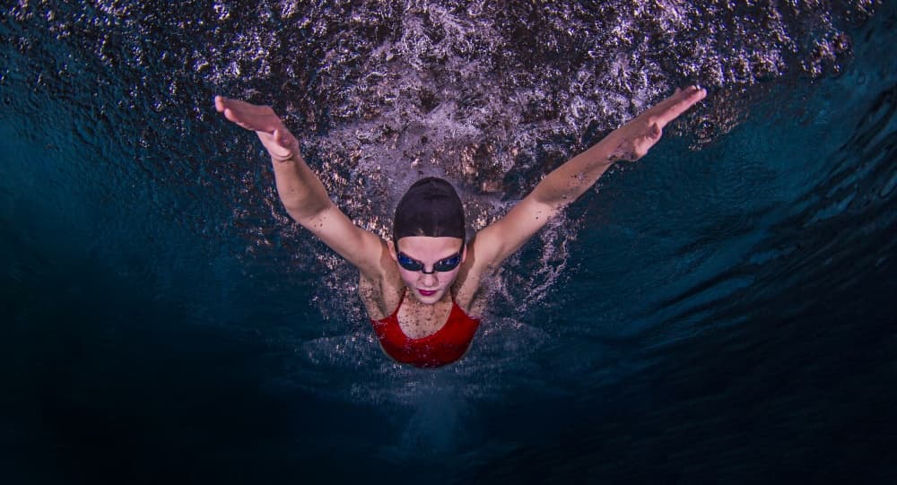 Underwater Power Stroke by Ken Kiefer — canvas wall art