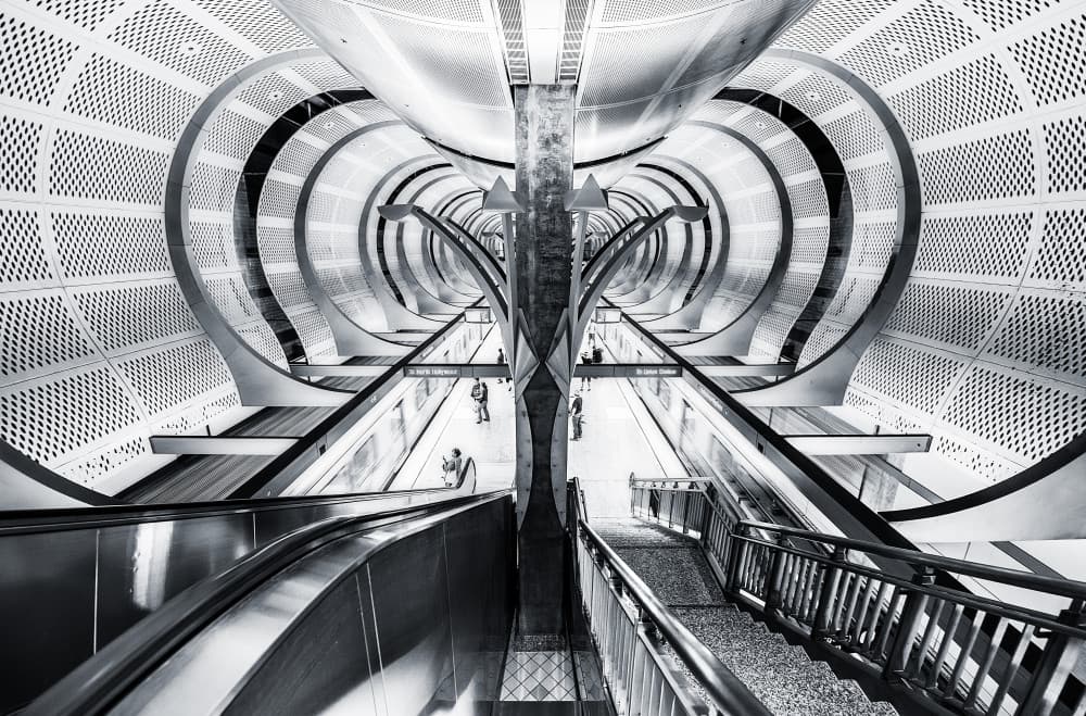 Symmetric Urban Escalators by Javier de la Torre — canvas wall art