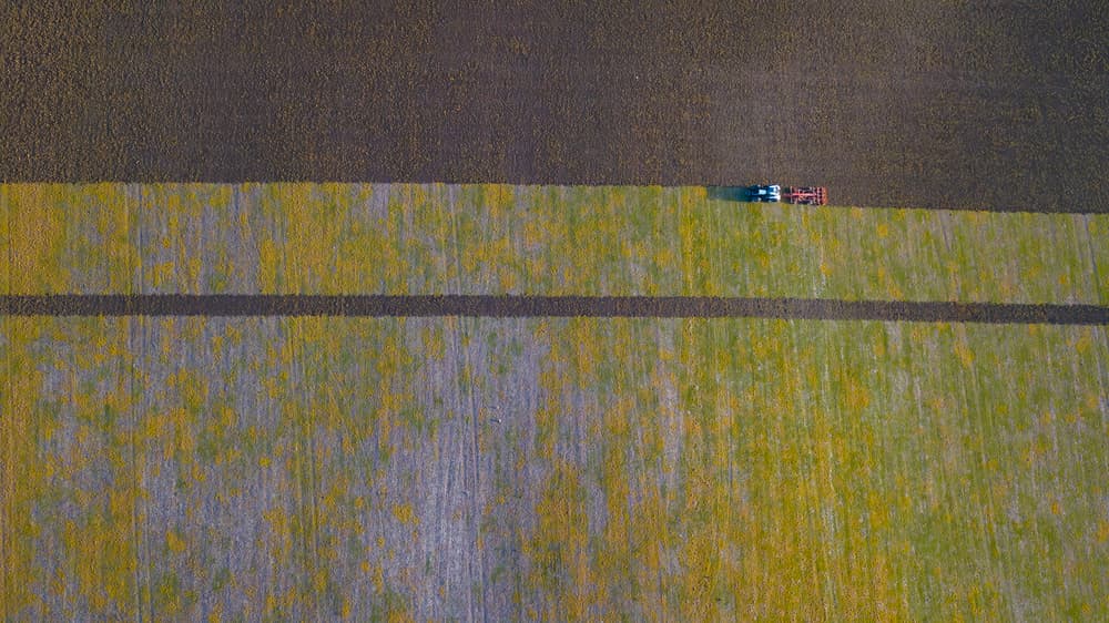 Tractor Plowing Field by Kutub Uddin — canvas wall art