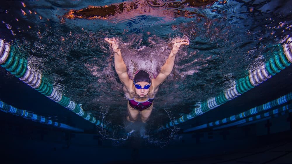 Dynamic Underwater Swimmer by Ken Kiefer — canvas wall art