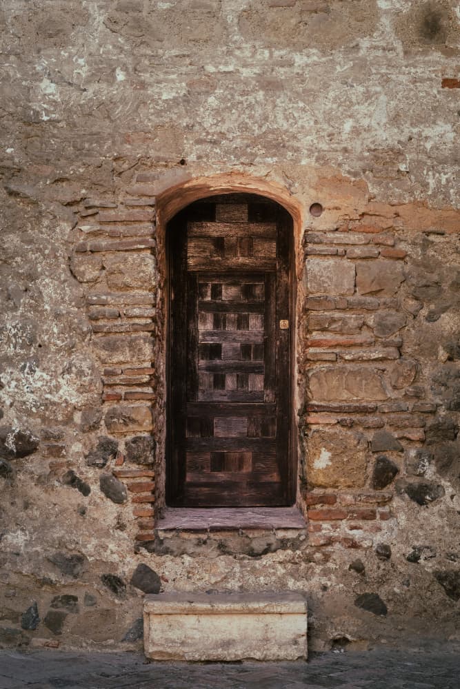 Old Arched Doorway by Aimee Giles — canvas wall art