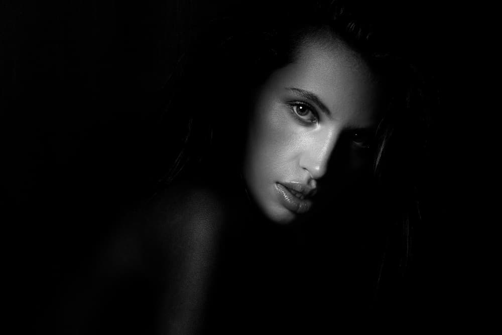 Shadowed Beauty Portrait by Carlo Joseph — canvas wall art
