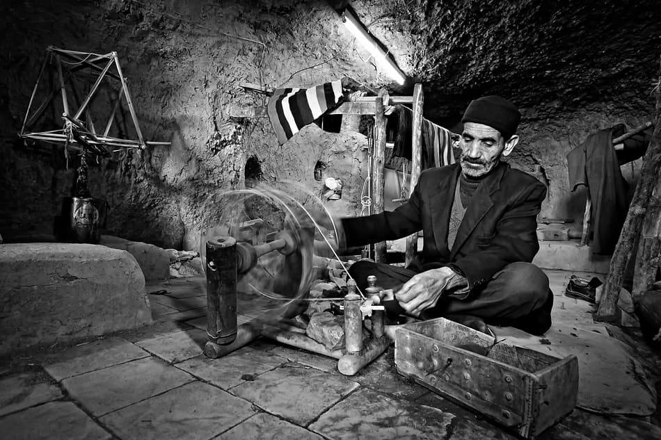 Artisan at Spinning Wheel by Mohammadreza Momeni — canvas wall art