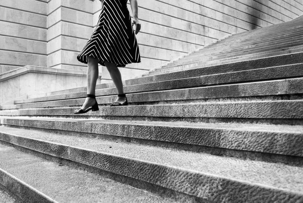 Woman on Stone Steps by Milena Seita — canvas wall art