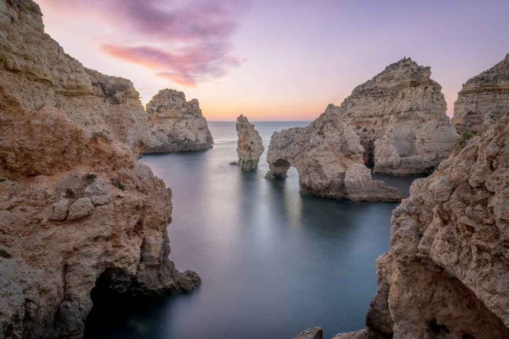 Purple Sunset Sea Arch by Xiaoyuan Xu — canvas wall art