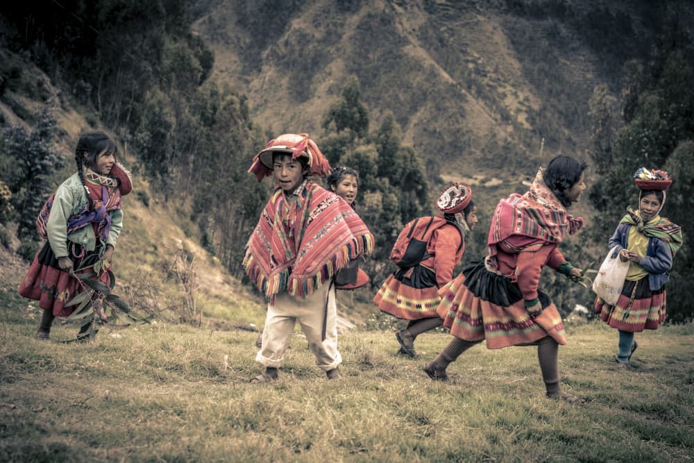 Andean Children in Traditional Dress by Eyal Alcalay — canvas wall art