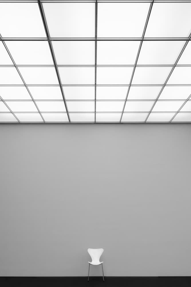 Quiet Space White Chair by Rolf Endermann — canvas wall art