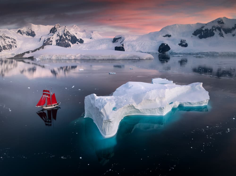Antarctic Red Sailboat by Karol Nienartowicz — canvas wall art