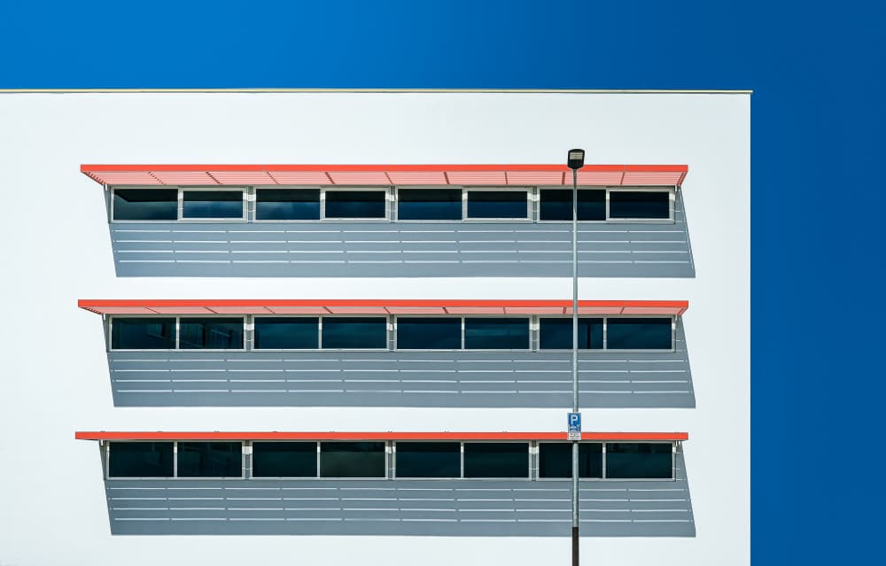 Modern Building Red Awnings by wiebe wilbers — canvas wall art
