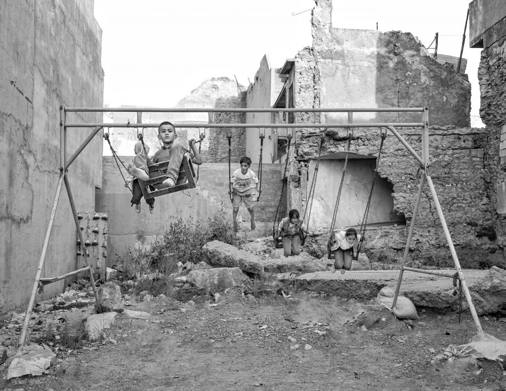 Childhood Amidst City Ruins by Bashar Alsofey — canvas wall art