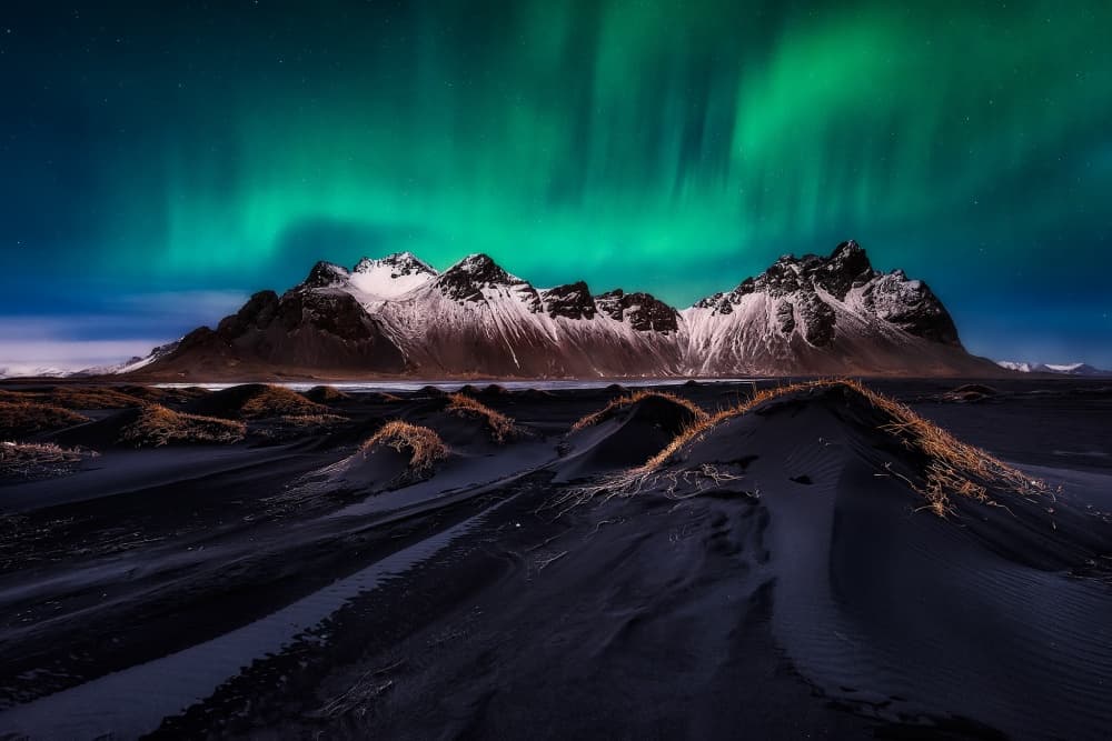 Northern Lights Over Mountains by Javier de la Torre — canvas wall art