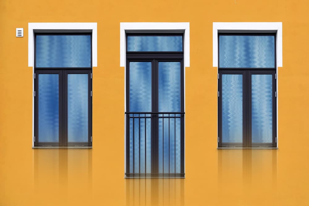 Vibrant Yellow Building Windows by Hans-Wolfgang Hawerkamp — canvas wall art