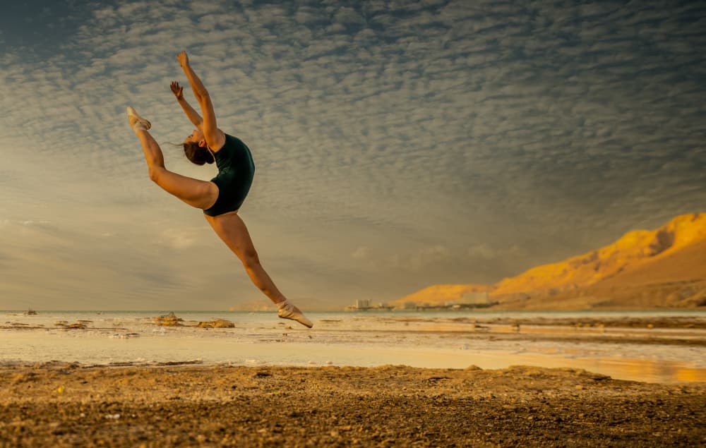 Dancer's Golden Leap by Ronen Rosenblatt — canvas wall art