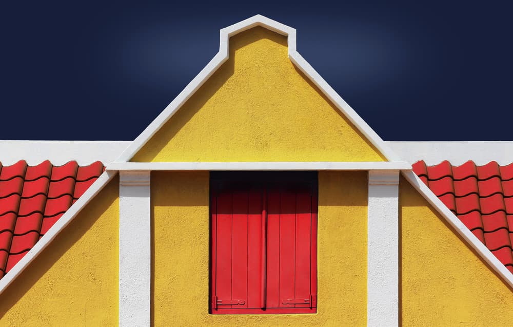 Yellow Gable Red Shutters by Hans-Wolfgang Hawerkamp — canvas wall art