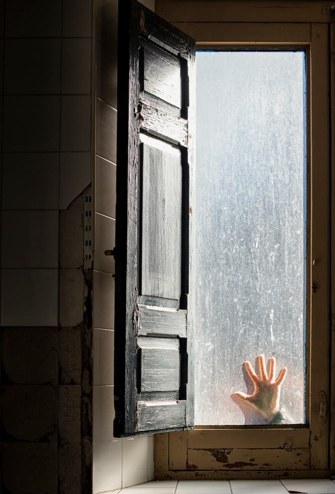 Hand On Grimy Window by Bego Amare — canvas wall art