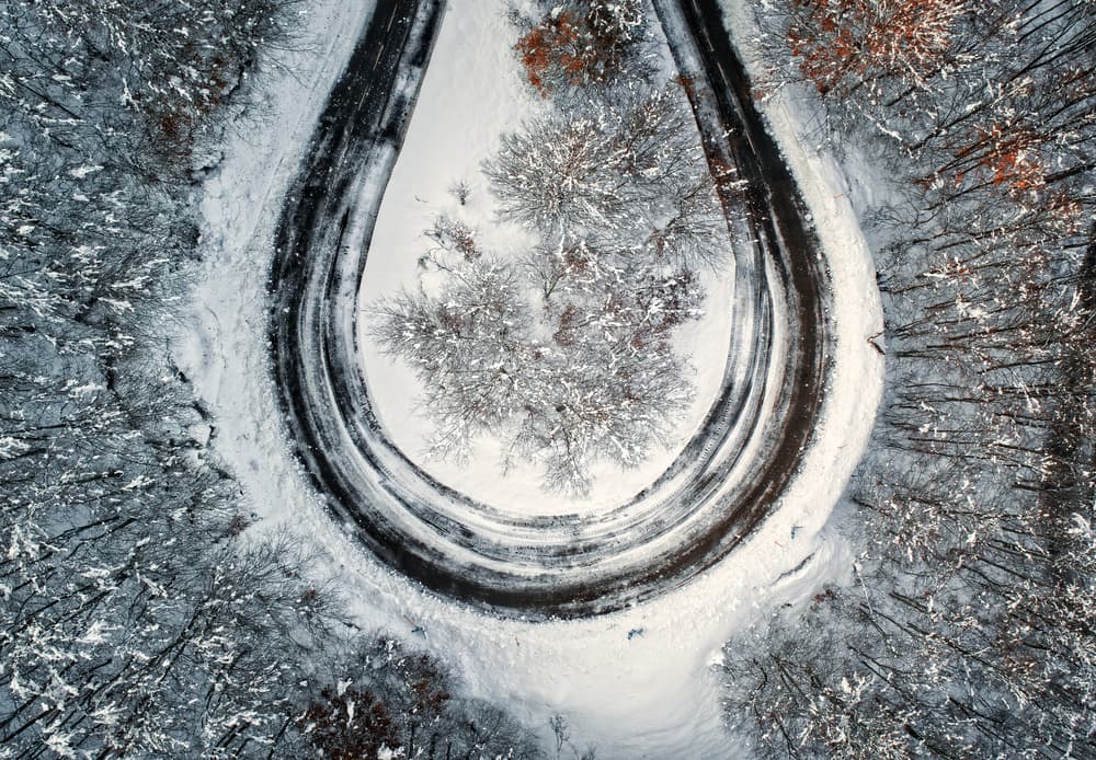 Winding Winter Road by Juan I. Cuadrado — canvas wall art