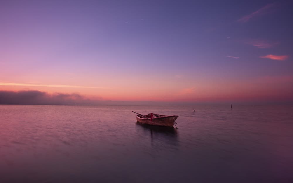Solitary Boat Twilight by JUAN CARLOS HERVÁS MARTÍNEZ — canvas wall art