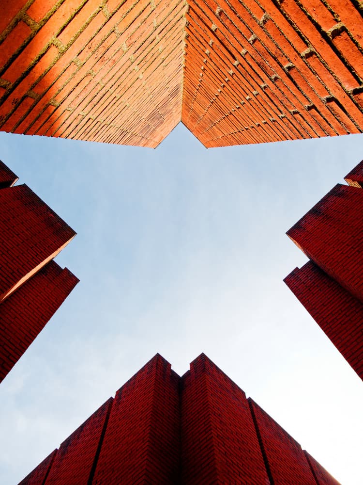 Abstract Brick Building Lines by Marius Surleac — canvas wall art