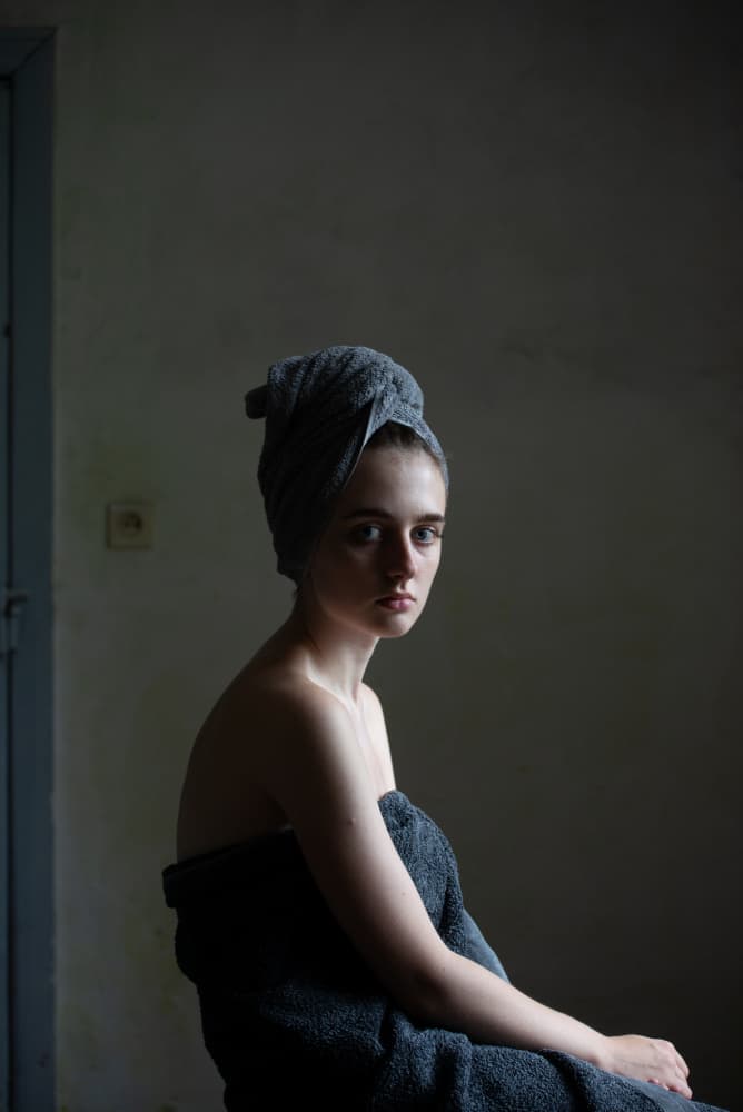 Pensive Woman In Towel by Małgorzata Masarz — canvas wall art