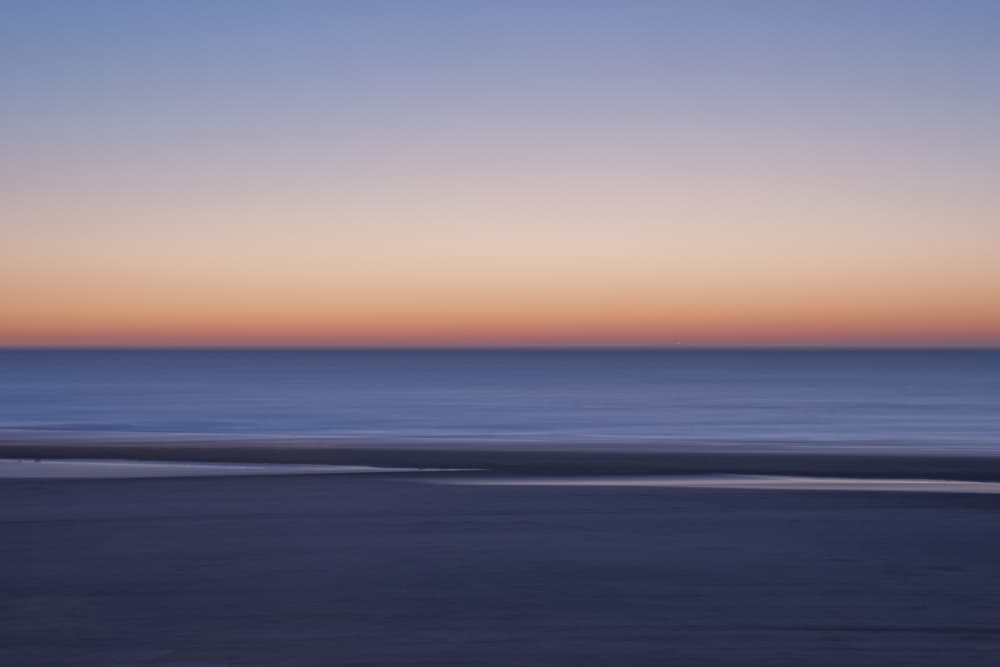 Peaceful Beach Sunset by Christa Stroo — canvas wall art