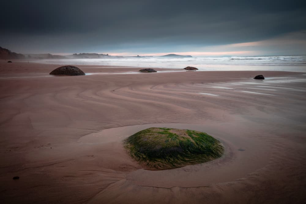 Moody Beach Rocks by Allan Li wp — canvas wall art