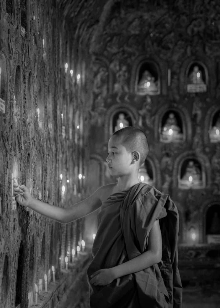 Young Monk Temple Candles by ADIREK M — canvas wall art
