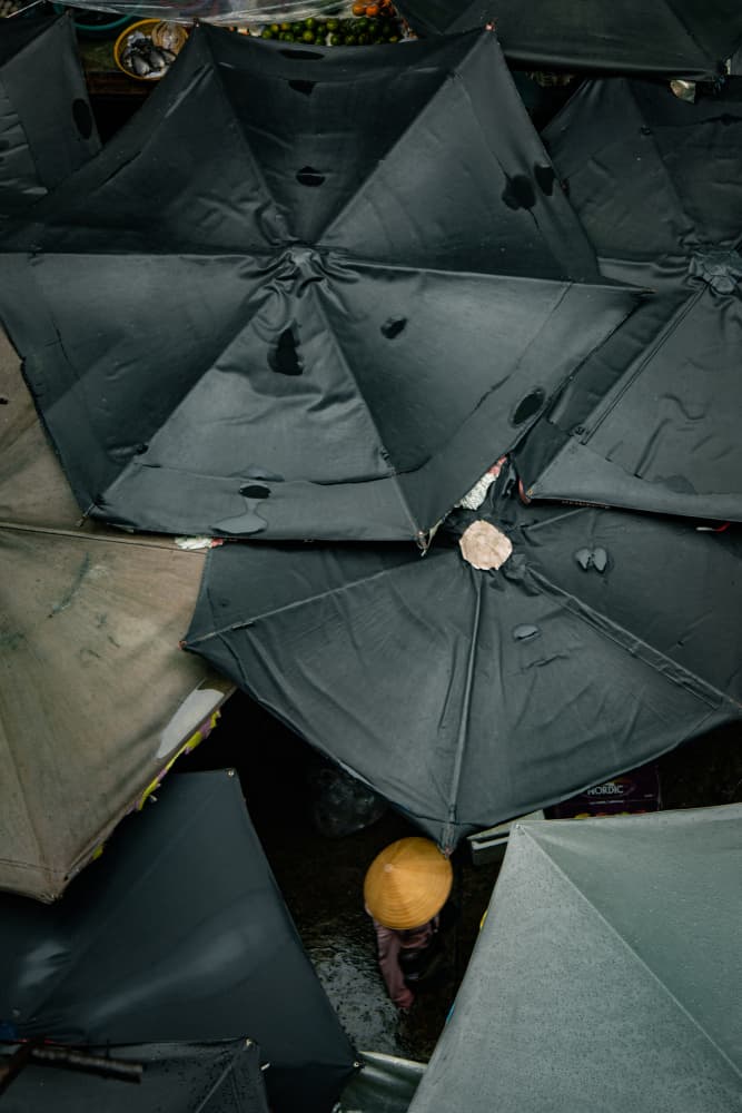 Conical Hat Market Umbrellas by Dzintra Zvagina — canvas wall art