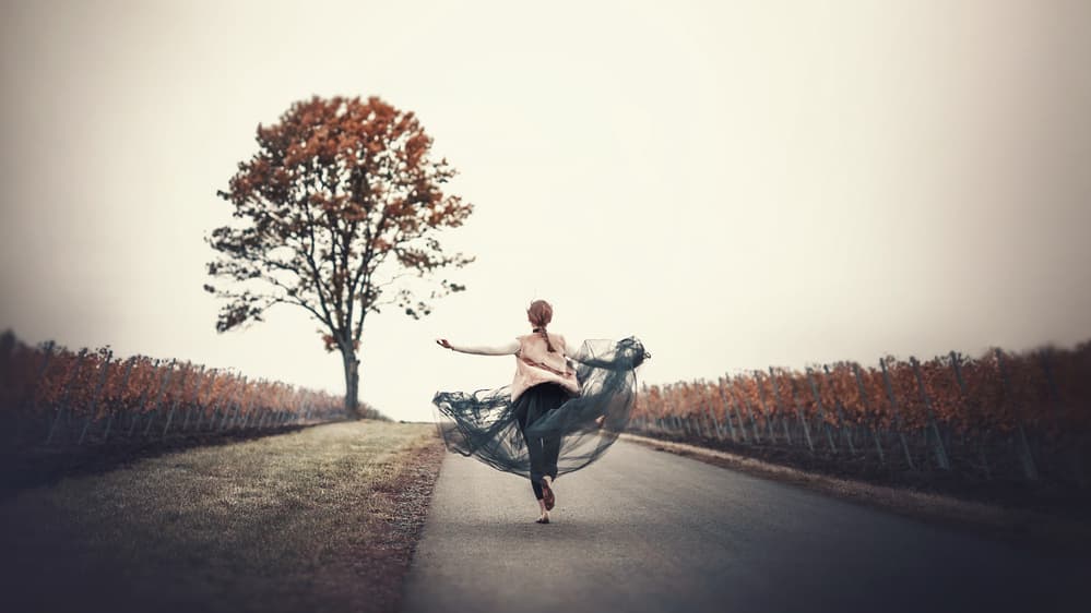 Woman's Autumn Journey by Bettina Tautzenberger — canvas wall art