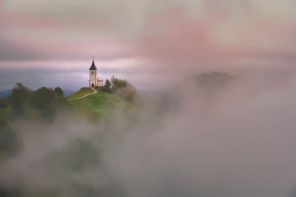 Misty Hilltop Church by Drago Vogrinec — canvas wall art