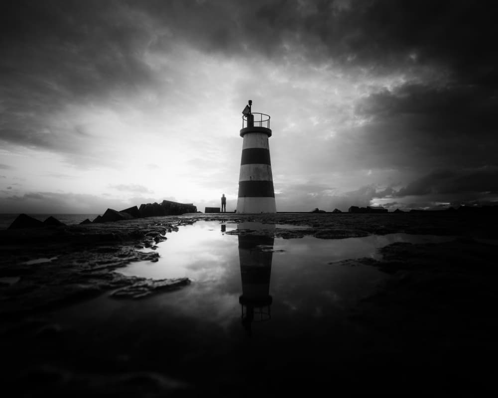 Lighthouse Reflection at Dusk by Marco Faria — canvas wall art