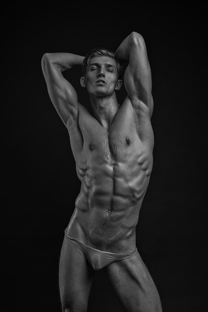 Striking Muscular Pose by QYun — canvas wall art
