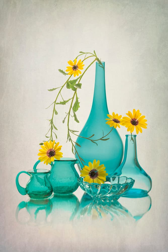 Blue Glass Yellow Flowers by Lydia Jacobs — canvas wall art
