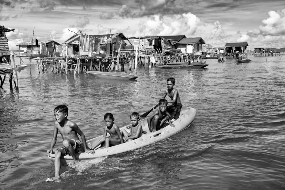Boys Of The Water Village by Kieron Long — canvas wall art