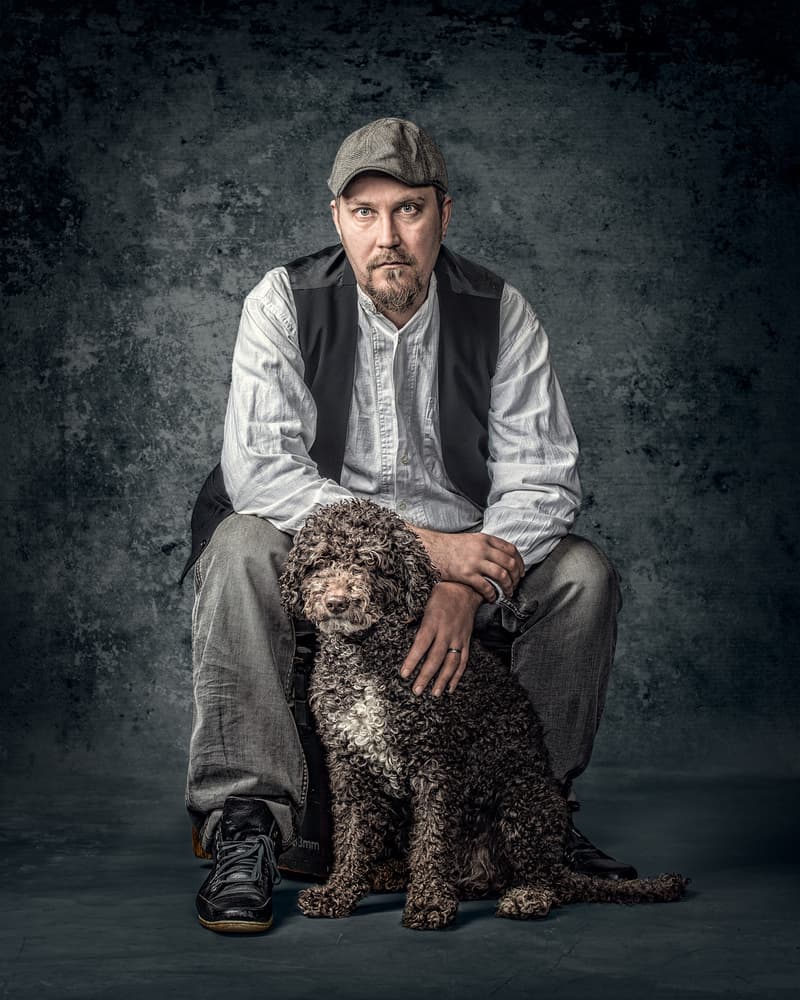 Man and Dog Portrait by Petri Damstén — canvas wall art