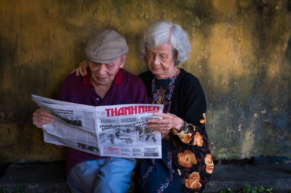 Elderly Couple Reading by HuongHoang — canvas wall art