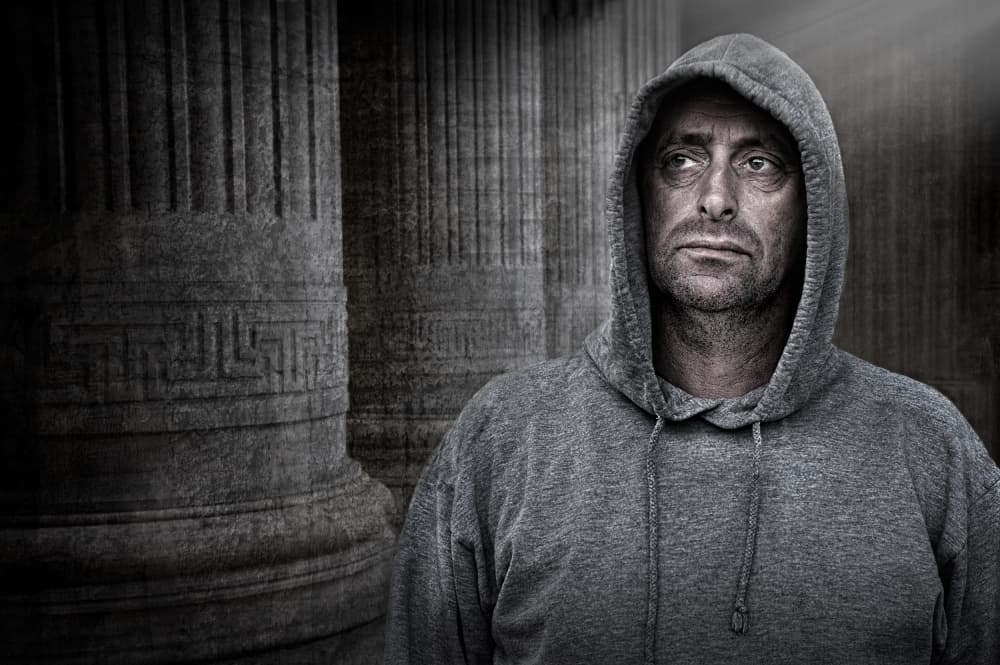 Pensive Hooded Man by Jan Scheunders — canvas wall art