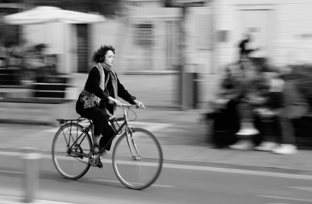 Urban Cycling In Motion by Itzik Einhorn — canvas wall art