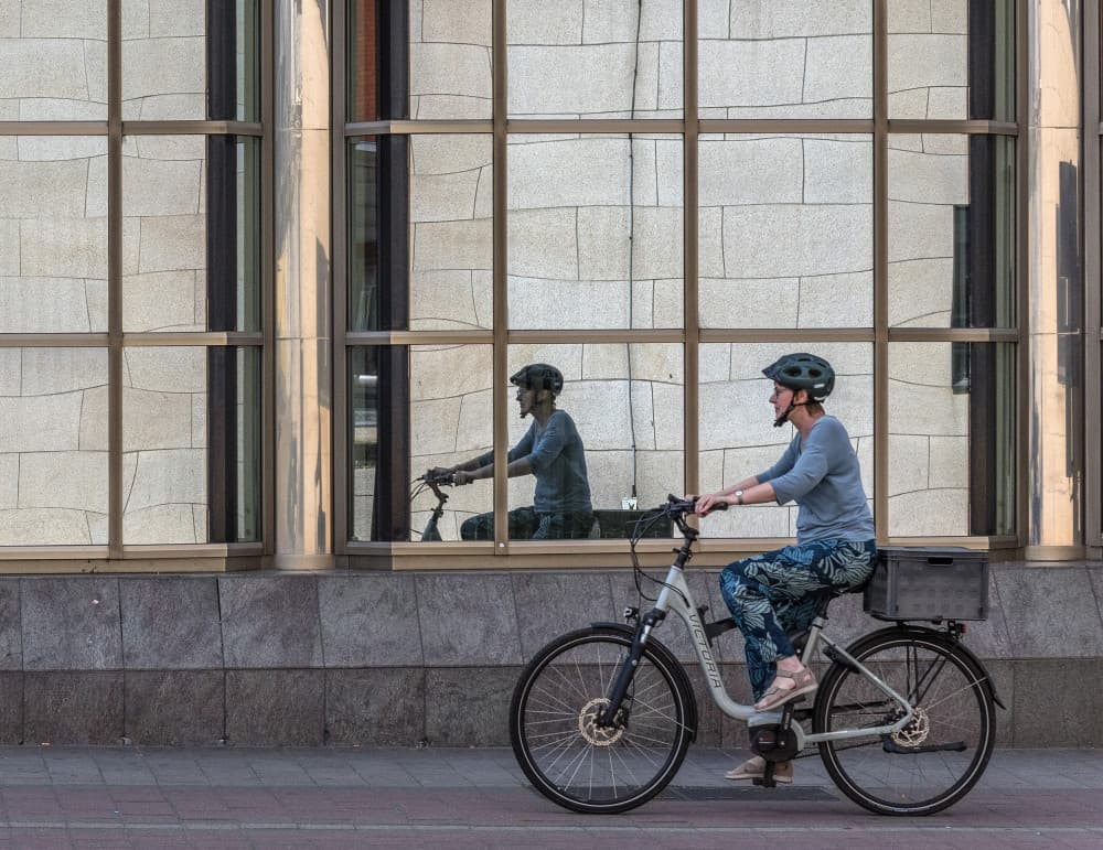 Urban Cyclist Reflection by Jef Van den Houte — canvas wall art
